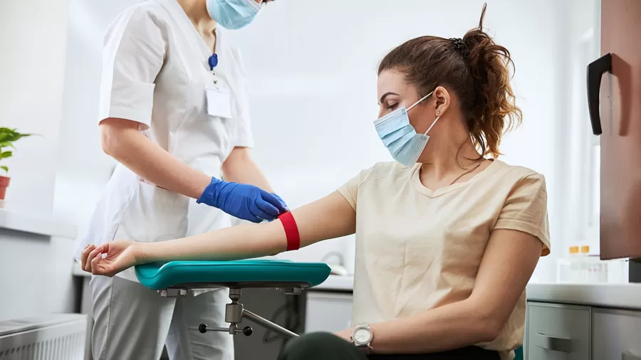 phlebotomist-_with_patient_1315395944.png
